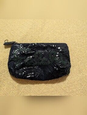Carlos Falchi snakeskin cosmetic clutch